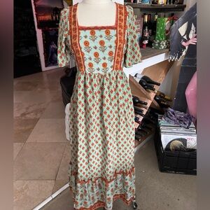 Chic Floral Maxi Dress with Orange and Green Accents